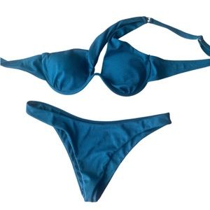 Sexy teal bikini with one shoulder top. Very flattering! Size L